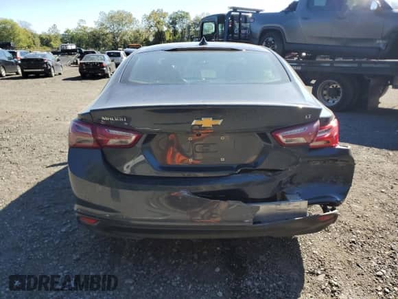 2020 Chevrolet Malibu LT с VIN 1G1ZD5ST9LF010004, выставлен на аукционе Copart как лот 84616915 с пробегом 102 437 миль миль и Списание • Salvage title. История ставок и продаж доступна на DreamBid. Изображение 6.