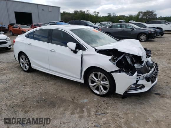 ✅ 2017 Chevrolet Cruze Premier • VIN: 1G1BF5SMXH7196917 • Lot: 46760013. Listed on Copart with 69,089 mi. Free auction sales archive from the USA and detailed vehicle history report at DreamBid. Image 4.