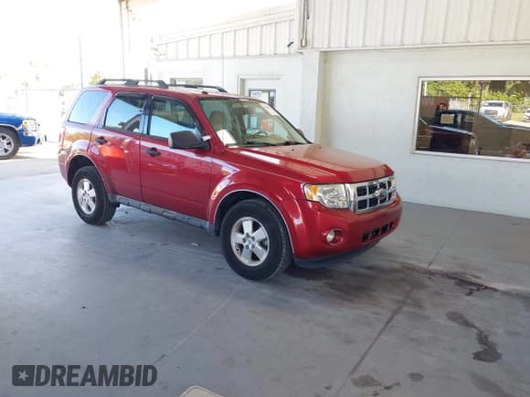 ✅ 2012 Ford Escape XLT • VIN: 1FMCU0DG1CKA62746 • Lot: 43468442. Listed on IAAI with 103,398 mi. Free auction sales archive from the USA and detailed vehicle history report at DreamBid. Image 1.