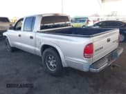 ✅ 2003 Dodge Dakota SLT • VIN: 1D7HL48N13S294573 • Lot: 41291127. Wystawiony na IAAI z przebiegiem 227 355 mil. Bezpłatny archiwum sprzedaży aukcyjnych z USA i szczegółowy raport historii pojazdu na DreamBid. Zdjęcie 3.
