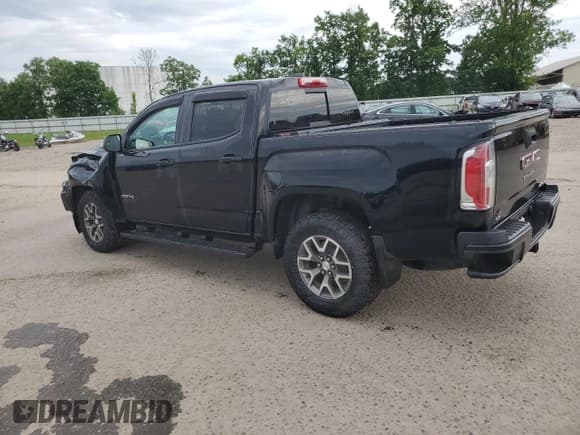 ✅ 2021 GMC Canyon 4WD AT4 • VIN: 1GTG6FEN1M1103321 • Lot: 62880185. Listed on Copart with 43,893 mi. Free auction sales archive from the USA and detailed vehicle history report at DreamBid. Image 2.