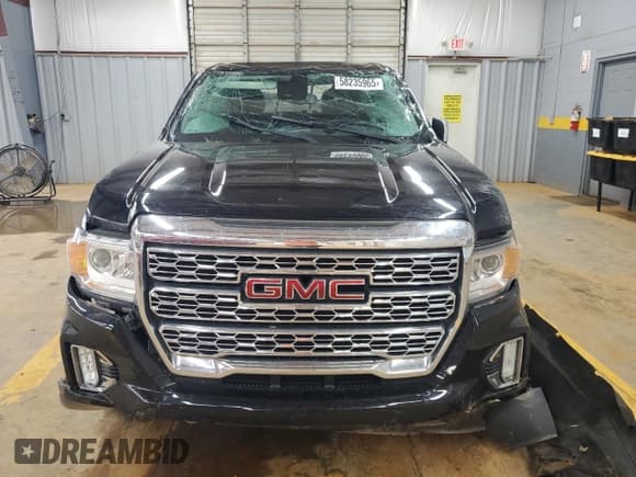 ✅ 2021 GMC Canyon 4WD Denali • VIN: 1GTG6EEN9M1101827 • Лот: 58235965. Опубликован ранее на Copart с пробегом Не указан. Бесплатный доступ к архиву аукционных продаж из США и подробный отчёт об истории автомобиля на DreamBid. Изображение 5.