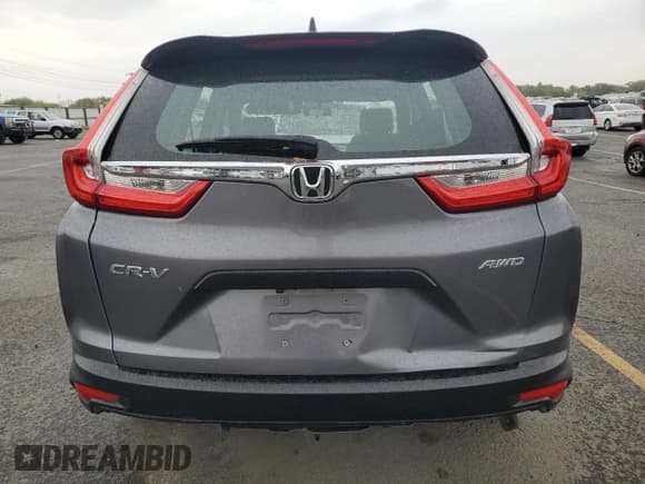 ✅ 2018 Honda CR-V LX • VIN: 2HKRW6H32JH220400 • Lot: 70178085. Wystawiony na Copart z przebiegiem 91 930 mil. Bezpłatny archiwum sprzedaży aukcyjnych z USA i szczegółowy raport historii pojazdu na DreamBid. Zdjęcie 6.