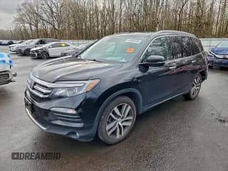 ✅ 2017 Honda Pilot Touring • VIN: 5FNYF6H94HB022653 • Lot: 94408435. Listed on Copart with 74,411 mi. Free auction sales archive from the USA and detailed vehicle history report at DreamBid. Image 1.