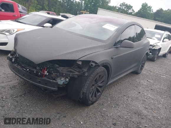 ✅ 2016 Tesla Model X 70D • VIN: 5YJXCDE28GF026378 • Lot: 42352156. Listed on IAAI with 103,206 mi. Free auction sales archive from the USA and detailed vehicle history report at DreamBid. Image 2.