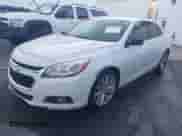 2014 Chevrolet Malibu LT z VIN 1G11E5SL0EF287282, wystawiony jako IAAI lot #43211305 z przebiegiem 185 026 mil mil oraz . Historia ofert i sprzedaży dostępna na DreamBid. Obrazek 2.