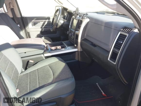 ✅ 2015 Ram 1500 SLT • VIN: 1C6RR6GG0FS578106 • Lot: 41671542. Listed on IAAI with 103,159 mi. Free auction sales archive from the USA and detailed vehicle history report at DreamBid. Image 5.