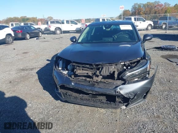 ✅ 2025 Honda Civic LX • VIN: 2HGFE2F21SH506677 • Lot: 43492570. Listed on IAAI with 49,571 mi. Free auction sales archive from the USA and detailed vehicle history report at DreamBid. Image 13.