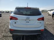 ✅ 2015 Hyundai Santa Fe Limited • VIN: 5XYZUDLA2FG258207 • Lot: 68584043. Listed on Copart with 214,993 mi. Free auction sales archive from the USA and detailed vehicle history report at DreamBid. Image 6.