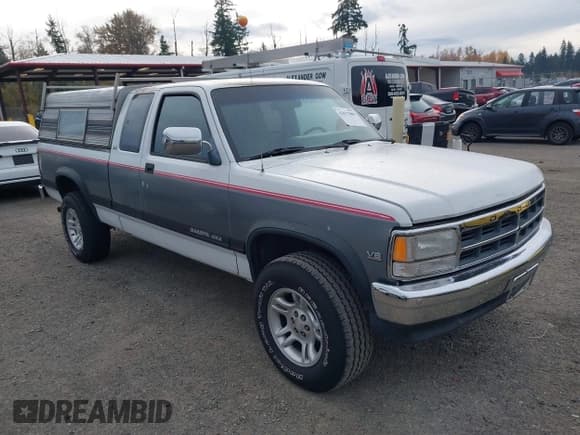 ✅ 1992 Dodge Dakota • VIN: 1B7GG23Y1NS526933 • Lot: 43677880. Listed on IAAI with 116,044 mi. Free auction sales archive from the USA and detailed vehicle history report at DreamBid. Image 1.