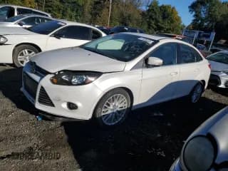 ✅ 2013 Ford Focus Titanium • VIN: 1FADP3J26DL141843 • Лот: 87029325. Опубликован ранее на Copart с пробегом 186 178 миль. Бесплатный доступ к архиву аукционных продаж из США и подробный отчёт об истории автомобиля на DreamBid. Изображение 1.