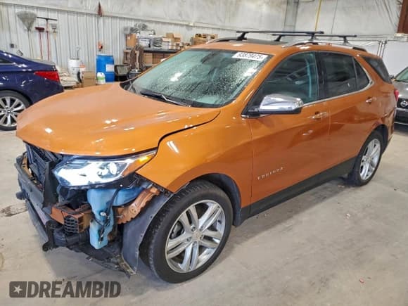 ✅ 2018 Chevrolet Equinox Premier • VIN: 2GNAXWEX9J6199199 • Lot: 93879475. Wystawiony na Copart z przebiegiem 87 660 mil. Bezpłatny archiwum sprzedaży aukcyjnych z USA i szczegółowy raport historii pojazdu na DreamBid. Zdjęcie 1.