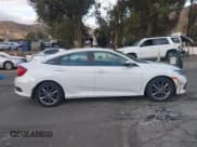 ✅ 2020 Honda Civic EX-L • VIN: 19XFC1F73LE209840 • Lot: 43728355. Listed on IAAI with 101,066 mi. Free auction sales archive from the USA and detailed vehicle history report at DreamBid. Image 13.