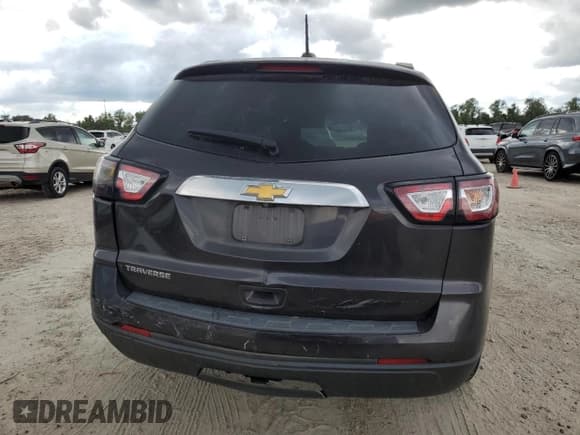 ✅ 2017 Chevrolet Traverse LS • VIN: 1GNKRFKD1HJ260339 • Lot: 70948874. Wystawiony na Copart z przebiegiem 187 263 mil. Bezpłatny archiwum sprzedaży aukcyjnych z USA i szczegółowy raport historii pojazdu na DreamBid. Zdjęcie 6.