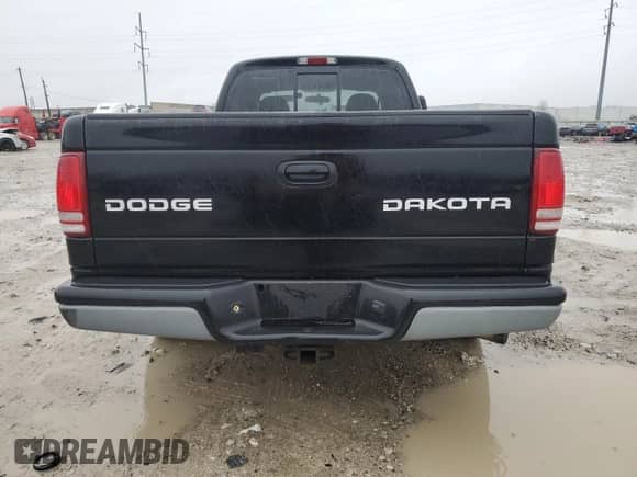 2004 Dodge Dakota Sport z VIN 1D7GL32N34S708694, wystawiony jako Copart lot #85050064 z przebiegiem Nie podano mil oraz Szkoda całkowita • Salvage title. Historia ofert i sprzedaży dostępna na DreamBid. Obrazek 6.