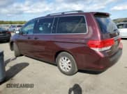 ✅ 2010 Honda Odyssey EX-L • VIN: 5FNRL3H77AB060572 • Lot: 82253525. Listed on Copart with 95,772 mi. Free auction sales archive from the USA and detailed vehicle history report at DreamBid. Image 2.