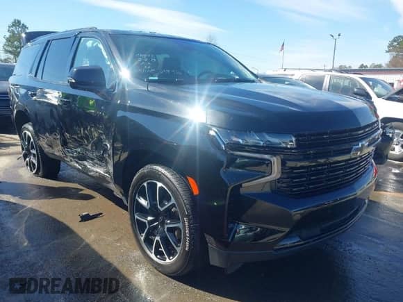 2023 Chevrolet Tahoe RST with VIN 1GNSKRKL2PR244986, listed as a IAAI auction lot 41571368 with 47,646 mi miles and . Bid and sale history available at DreamBid. Image 1.