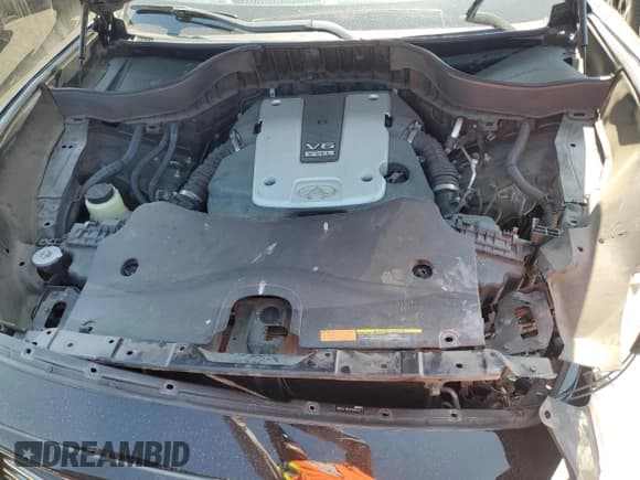 ✅ 2015 Infiniti QX70 • VIN: JN8CS1MU9FM380312 • Lot: 54104005. Listed on Copart with 100,678 mi. Free auction sales archive from the USA and detailed vehicle history report at DreamBid. Image 12.