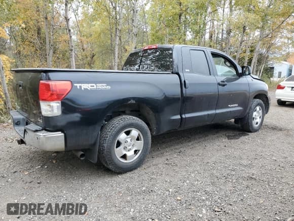✅ 2012 Toyota Tundra • VIN: 5TFUM5F1XCX030038 • Lot: 86052815. Listed on Copart with 322,858 mi. Free auction sales archive from the USA and detailed vehicle history report at DreamBid. Image 3.