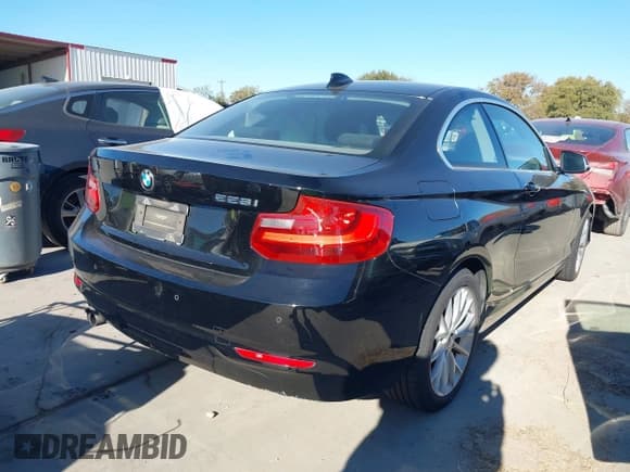✅ 2014 BMW 2 Series 228i • VIN: WBA1F5C59EVV99592 • Lot: 43673726. Listed on IAAI with 130,778 mi. Free auction sales archive from the USA and detailed vehicle history report at DreamBid. Image 4.