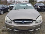 ✅ 2003 Ford Taurus LX • VIN: 1FAFP522X3G139359 • Lot: 43767410. Wystawiony na IAAI z przebiegiem 70 630 mil. Bezpłatny archiwum sprzedaży aukcyjnych z USA i szczegółowy raport historii pojazdu na DreamBid. Zdjęcie 6.