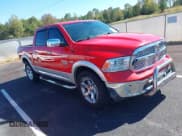 ✅ 2015 Ram 1500 Laramie • VIN: 1C6RR7NT7FS653115 • Lot: 43441542. Listed on IAAI with 148,784 mi. Free auction sales archive from the USA and detailed vehicle history report at DreamBid. Image 1.