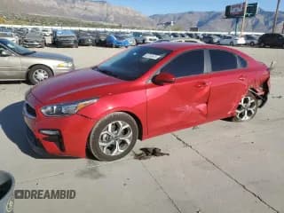 ✅ 2021 Kia Forte LXS • VIN: 3KPF24AD4ME352900 • Лот: 82753475. Опубликован ранее на Copart с пробегом 66 079 миль. Бесплатный доступ к архиву аукционных продаж из США и подробный отчёт об истории автомобиля на DreamBid. Изображение 1.