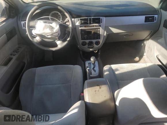 ✅ 2005 Suzuki Forenza S • VIN: KL5JD56Z95K119565 • Лот: 43051135. Опубликован ранее на Copart с пробегом 143 172 миль. Бесплатный доступ к архиву аукционных продаж из США и подробный отчёт об истории автомобиля на DreamBid. Изображение 8.