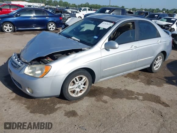 ✅ 2005 Kia Spectra LX • VIN: KNAFE121955143141 • Lot: 42767872. Listed on IAAI with 178,724 mi. Free auction sales archive from the USA and detailed vehicle history report at DreamBid. Image 2.