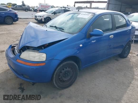 2006 Chevrolet Aveo LS z VIN KL1TD56696B543863, wystawiony jako IAAI lot #41446969 z przebiegiem 222 866 mil mil oraz . Historia ofert i sprzedaży dostępna na DreamBid. Obrazek 17.