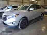 2018 Chevrolet Equinox LT с VIN 3GNAXSEVXJS577295, выставлен на аукционе Copart как лот 85662065 с пробегом 82 419 миль миль и Списание • Salvage title. История ставок и продаж доступна на DreamBid. Изображение 1.