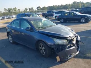 ✅ 2014 Chevrolet Cruze 1LT • VIN: 1G1PC5SB7E7144699 • Лот: 43241551. Опубликован ранее на IAAI с пробегом 156 411 миль. Бесплатный доступ к архиву аукционных продаж из США и подробный отчёт об истории автомобиля на DreamBid. Изображение 1.