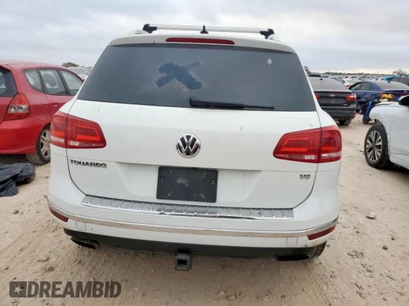 ✅ 2016 Volkswagen Touareg Lux • VIN: WVGEF9BP9GD000516 • Lot: 92743305. Wystawiony na Copart z przebiegiem 171 299 mil. Bezpłatny archiwum sprzedaży aukcyjnych z USA i szczegółowy raport historii pojazdu na DreamBid. Zdjęcie 6.