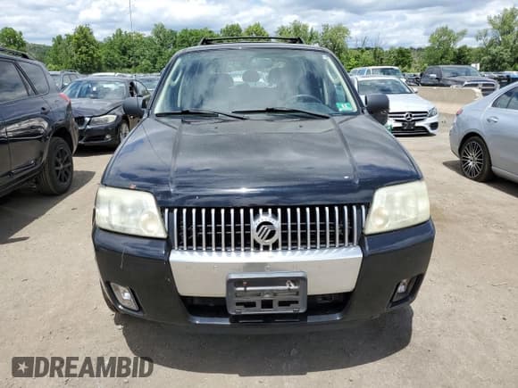 ✅ 2005 Mercury Mariner Luxury • VIN: 4M2CU57185DJ16120 • Лот: 61803024. Опубликован ранее на Copart с пробегом 176 498 миль. Бесплатный доступ к архиву аукционных продаж из США и подробный отчёт об истории автомобиля на DreamBid. Изображение 5.