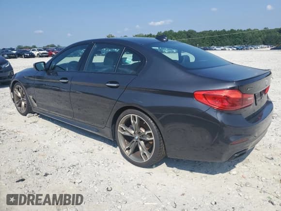 ✅ 2018 BMW 5 Series M550i xDrive • VIN: WBAJB9C55JB035565 • Лот: 69089415. Опубликован ранее на Copart с пробегом 48 913 миль. Бесплатный доступ к архиву аукционных продаж из США и подробный отчёт об истории автомобиля на DreamBid. Изображение 2.