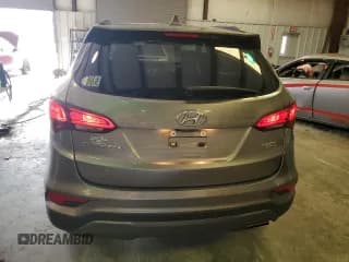 ✅ 2017 Hyundai Santa Fe 2.4L • VIN: 5NMZUDLB6HH048811 • Лот: 60130573. Опубликован ранее на Copart с пробегом 70 018 миль. Бесплатный доступ к архиву аукционных продаж из США и подробный отчёт об истории автомобиля на DreamBid. Изображение 6.