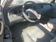 ✅ 2001 Lincoln Town Car Executive • VIN: 1LNHM81W81Y697408 • Lot: 71071315. Listed on Copart with 148,590 mi. Free auction sales archive from the USA and detailed vehicle history report at DreamBid. Image 8.