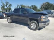 ✅ 2015 Chevrolet Silverado 1500 LT • VIN: 3GCUKREC7FG404405 • Lot: 89449565. Wystawiony na Copart z przebiegiem 170 322 mil. Bezpłatny archiwum sprzedaży aukcyjnych z USA i szczegółowy raport historii pojazdu na DreamBid. Zdjęcie 4.