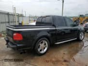 ✅ 2003 Ford F-150 Harley-Davidson • VIN: 1FTRW07333KD41438 • Lot: 54342755. Listed on Copart with 216,391 mi. Free auction sales archive from the USA and detailed vehicle history report at DreamBid. Image 3.