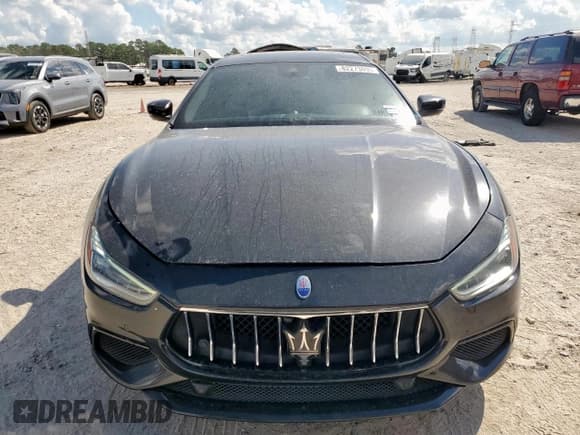 ✅ 2018 Maserati Ghibli S GranSport • VIN: ZAM57YSS4J1260150 • Лот: 82273095. Опубликован ранее на Copart с пробегом 166 306 миль. Бесплатный доступ к архиву аукционных продаж из США и подробный отчёт об истории автомобиля на DreamBid. Изображение 5.