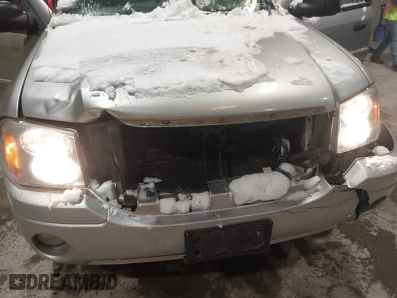 ✅ 2004 GMC Envoy SLT • VIN: 1GKET16S946128370 • Lot: 43866564. Listed on IAAI with 199,795 mi. Free auction sales archive from the USA and detailed vehicle history report at DreamBid. Image 6.