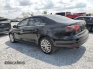 ✅ 2015 Volkswagen Jetta SE • VIN: 3VWD17AJ1FM238876 • Lot: 58957215. Listed on Copart with 122,705 mi. Free auction sales archive from the USA and detailed vehicle history report at DreamBid. Image 2.