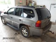 ✅ 2006 GMC Envoy SLE • VIN: 1GKDT13S762250462 • Lot: 42521572. Listed on IAAI with 282,232 mi. Free auction sales archive from the USA and detailed vehicle history report at DreamBid. Image 3.