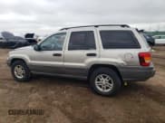 ✅ 2003 Jeep Grand Cherokee Laredo • VIN: 1J4GW48S83C600188 • Lot: 86791215. Listed on Copart with 171,990 mi. Free auction sales archive from the USA and detailed vehicle history report at DreamBid. Image 2.