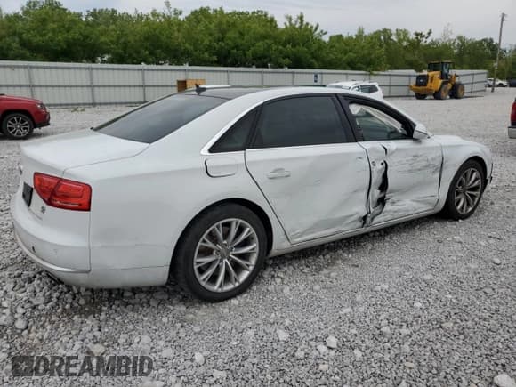 ✅ 2012 Audi A8 • VIN: WAURVAFD7CN020369 • Лот: 58360915. Опубликован ранее на Copart с пробегом 158 824 миль. Бесплатный доступ к архиву аукционных продаж из США и подробный отчёт об истории автомобиля на DreamBid. Изображение 3.
