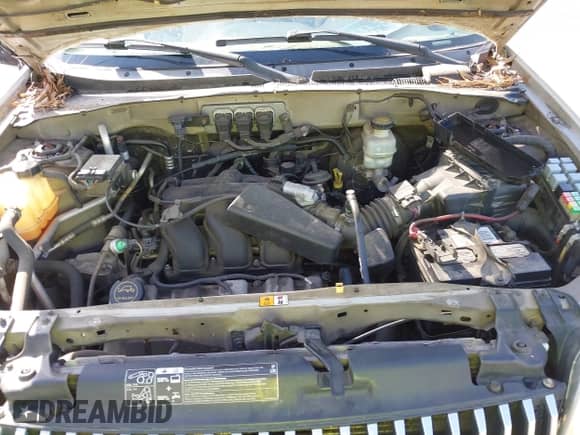 2005 Mercury Mariner Luxury z VIN 4M2CU56165DJ21267, wystawiony jako IAAI lot #41934003 z przebiegiem Nie podano mil oraz . Historia ofert i sprzedaży dostępna na DreamBid. Obrazek 10.