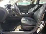 ✅ 2014 Ford Fusion Titanium Hybrid • VIN: 3FA6P0RU2ER285499 • Lot: 84596995. Listed on Copart with 191,277 mi. Free auction sales archive from the USA and detailed vehicle history report at DreamBid. Image 7.