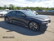 ✅ 2023 Lucid Air Touring • VIN: 50EA1TEA3PA003219 • Lot: 69670545. Listed on Copart with 24,349 mi. Free auction sales archive from the USA and detailed vehicle history report at DreamBid. Image 4.