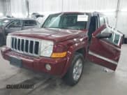 ✅ 2010 Jeep Commander Sport • VIN: 1J4RG4GK6AC140856 • Lot: 42285802. Listed on IAAI with 247,830 mi. Free auction sales archive from the USA and detailed vehicle history report at DreamBid. Image 2.