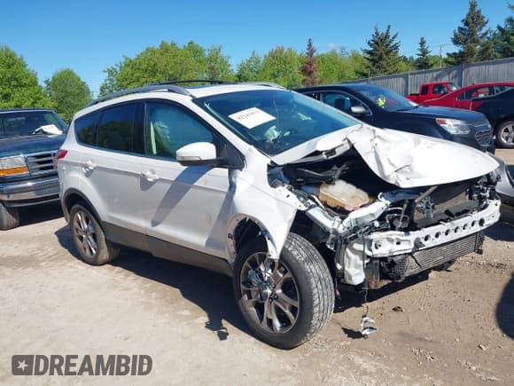 ✅ 2015 Ford Escape Titanium • VIN: 1FMCU9J9XFUA35967 • Lot: 42342432. Listed on IAAI with 160,442 mi. Free auction sales archive from the USA and detailed vehicle history report at DreamBid. Image 1.